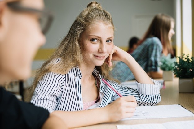 teenage student girl writing looking camera 23 2147666661